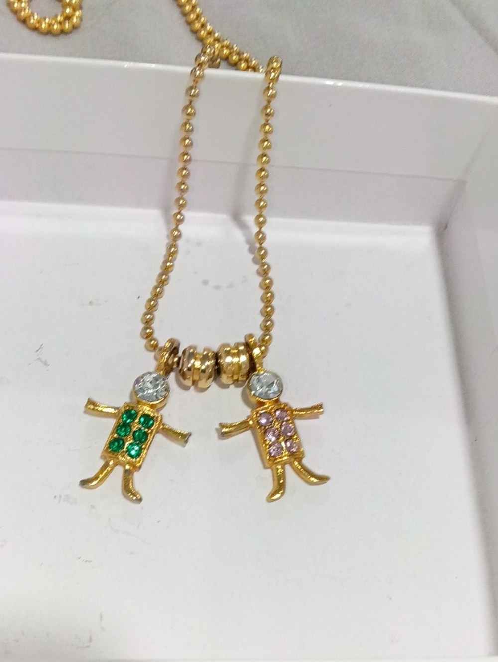 Brats USA KIS Gold Tone Double Girl Pendant Necklace with Green and Pink Stones